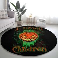 Round black Halloween rug with orange jack-o’-lantern skull face and green 'Children' title