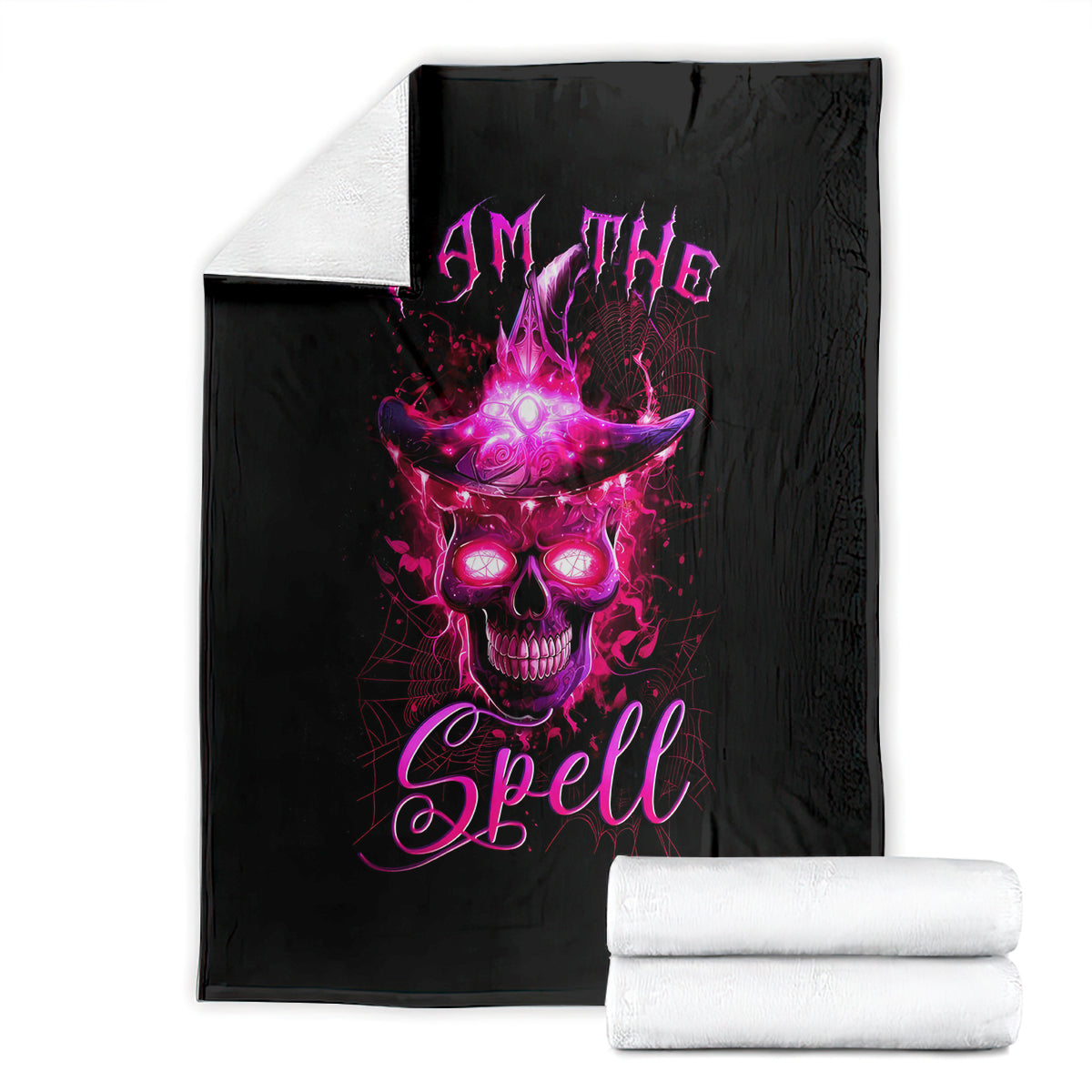 Black witch skull blanket with purple 'I AM THE Spell' graphic, stacked with white rolls