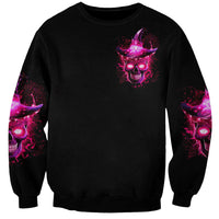 Black unisex sweatshirt with small purple witch skull back print and matching sleeve art