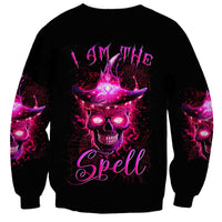 Black unisex sweatshirt with purple witch skull graphic and 'Spell' text on chest
