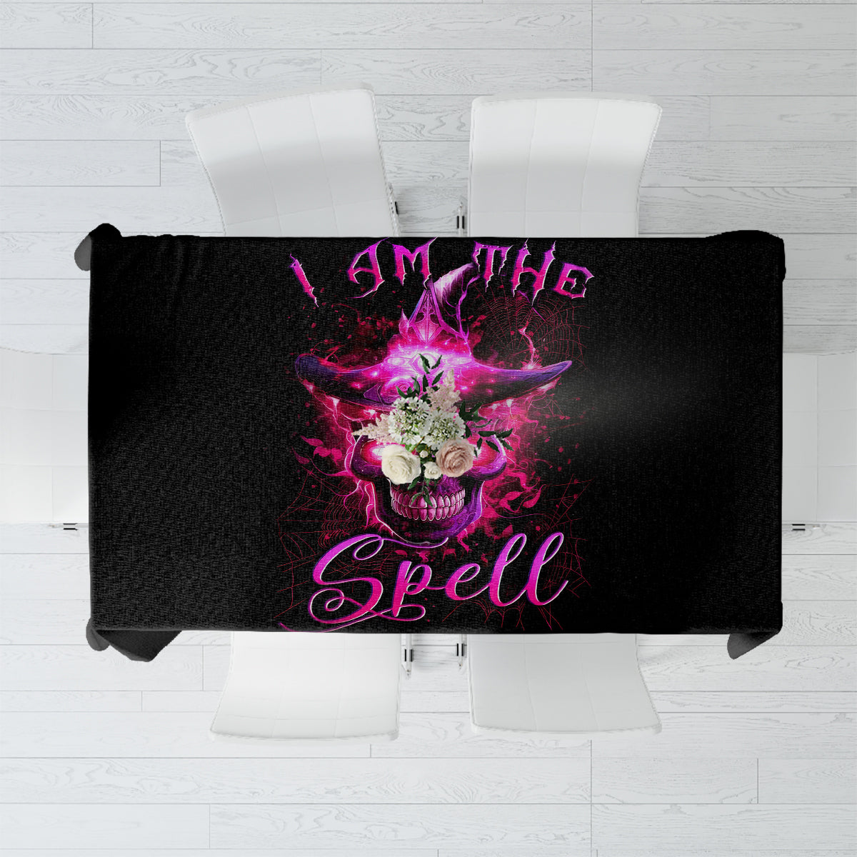 Black tablecloth close-up with purple witch skull and 'Witch Spell' text in center
