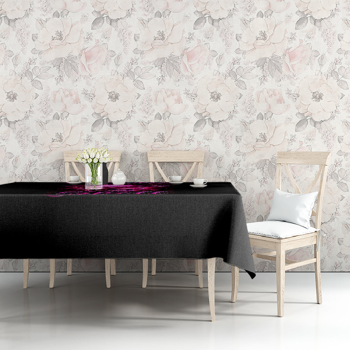 Black tablecloth on console table with purple witch skull graphic and straight drape