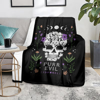 Black cat skull blanket on sofa with cats, flowers, moons, and 'PURR EVIL' design