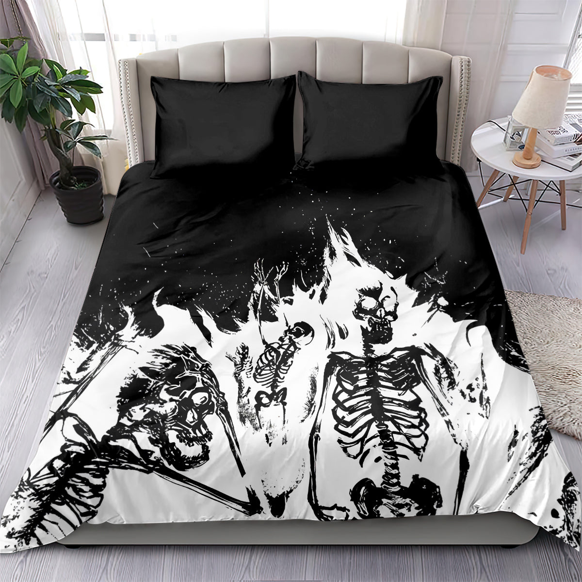 Skull-themed bedding set with black and white skeleton artwork and two matching pillowcases.