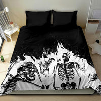 Skull-themed bedding set with black and white skeleton artwork on duvet and two pillowcases.