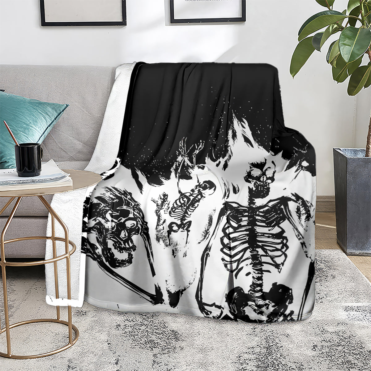 Skull skeleton graphic throw blanket on sofa, black and white distressed art