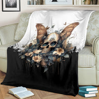 Gothic butterfly skull blanket on sofa, white upper panel and black lower panel