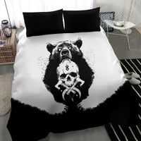 Black-and-white bear skull duvet cover with two dark pillowcases, front view