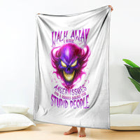 White draped throw blanket with centered purple flame skull graphic and slogan text