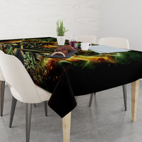 Black skull-and-rose tablecloth on dining table with chairs