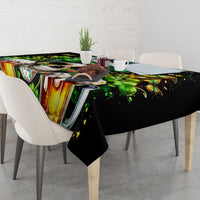Black tablecloth with clover, butterflies and ribboned skull design across dining table