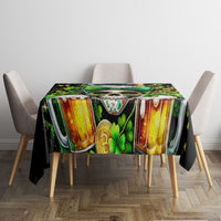 Black tablecloth featuring striped artwork, shamrocks and skull graphic on table