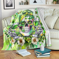 Green fantasy skull blanket with green-haired figure, shamrocks, and wine glasses