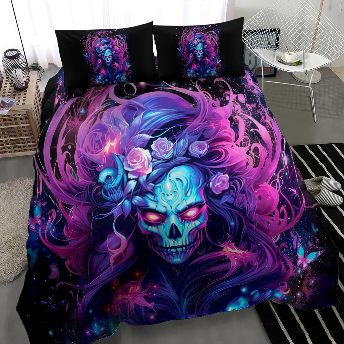 Black skull bedding set with large purple-blue skull artwork across the comforter and two pillowcases