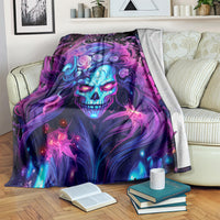 Skull graphic blanket with purple and blue neon-style artwork