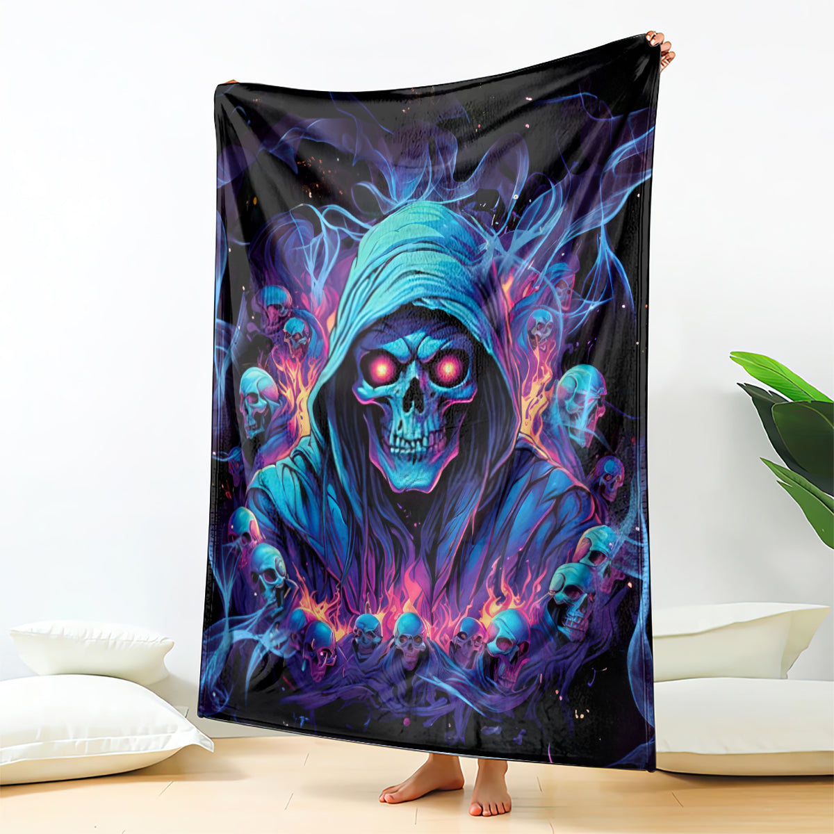 Skull-themed blanket hanging display with blue hooded reaper face and fiery flames