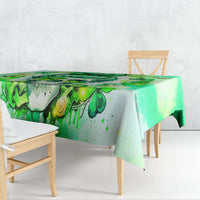 Green Irish skull tablecloth draped over a dining table, leprechaun-themed print.