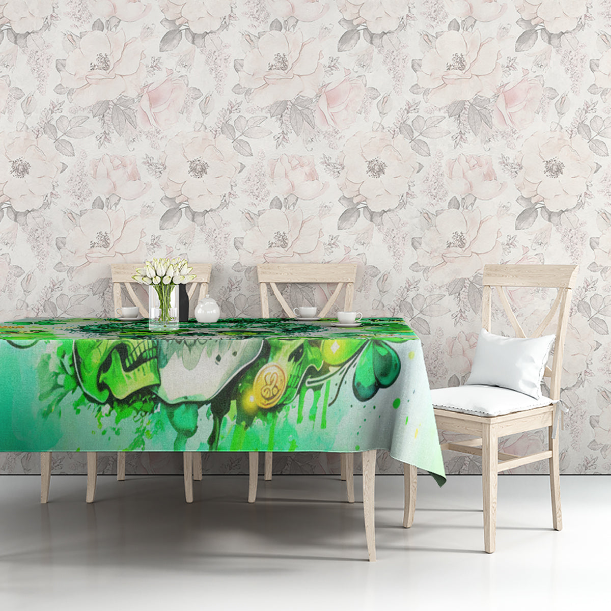Green tablecloth featuring Irish skull, shamrock, and gold coin details on a table set.