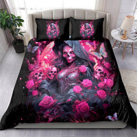 Black bedding set with pink skull-witch print and two matching pillowcases on bed