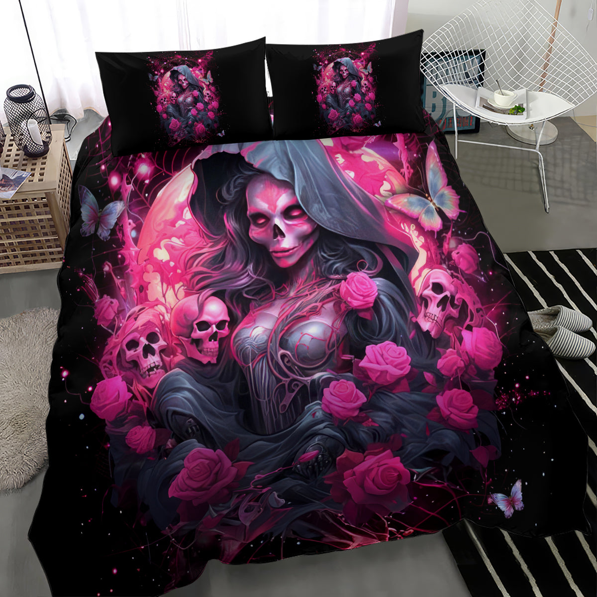 Black bedding set with pink skull-witch duvet cover and two pillowcases, angled view
