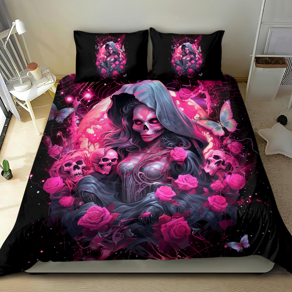 Black bedding set with pink skull-witch duvet and two matching pillowcases on bed