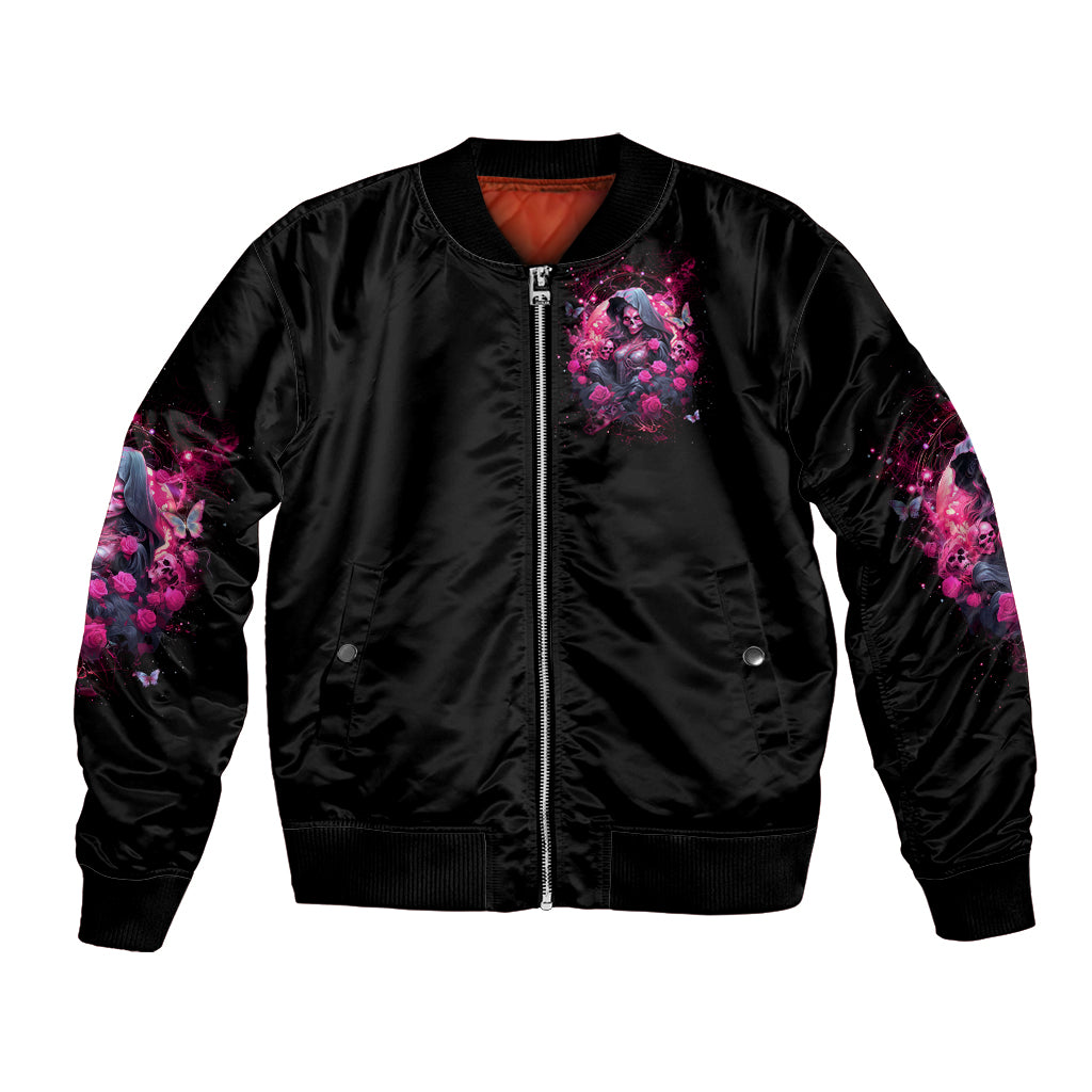 Black bomber jacket with front zipper and purple floral witch skull graphic on chest