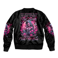 Black bomber jacket with witch skull and floral artwork on the back, ribbed collar