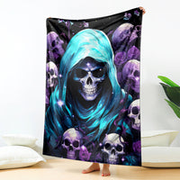Skull hooded blanket with blue hood and purple skull pattern, draped in room