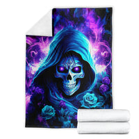 Folded skull hood blanket with dark background, neon blue glowing skull and purple rose accents
