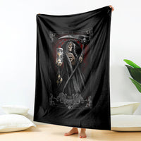 Black reaper skull graphic blanket with skeleton holding lantern and scythe, draped