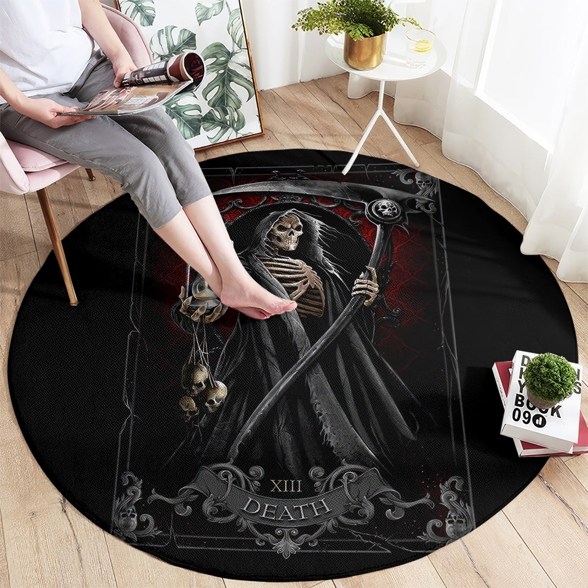 Black round area rug with skeletal figure holding scythe and 'XIII DEATH' banner