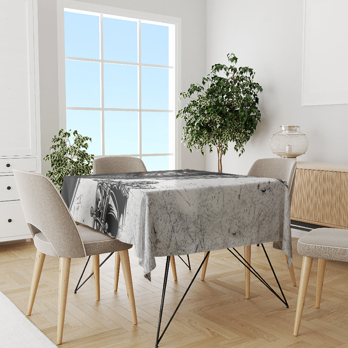 Rectangular tablecloth with gray marbled print and black motorcycle panel motif on dining set