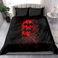 Black bedding set with red skull artwork on duvet and two dark pillowcases
