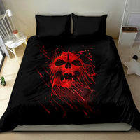 Black bed duvet set with red skull face print and two matching pillowcases