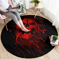 Black round rug featuring red skull and blood splatter across the center