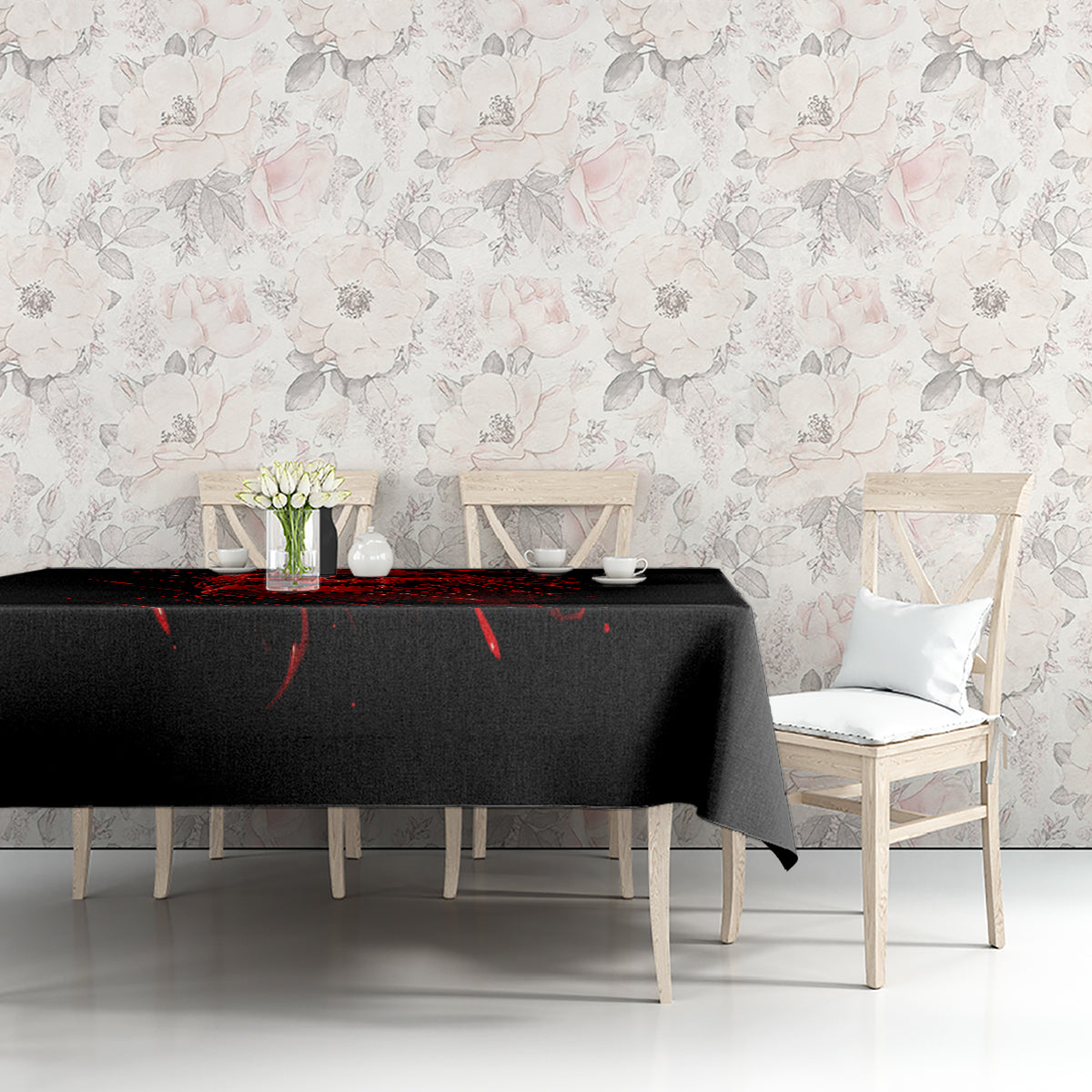 Black tablecloth with red skull graphic and drips, on dining table