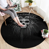 Black round skull graphic carpet rug with large central skull and sweeping wing design.