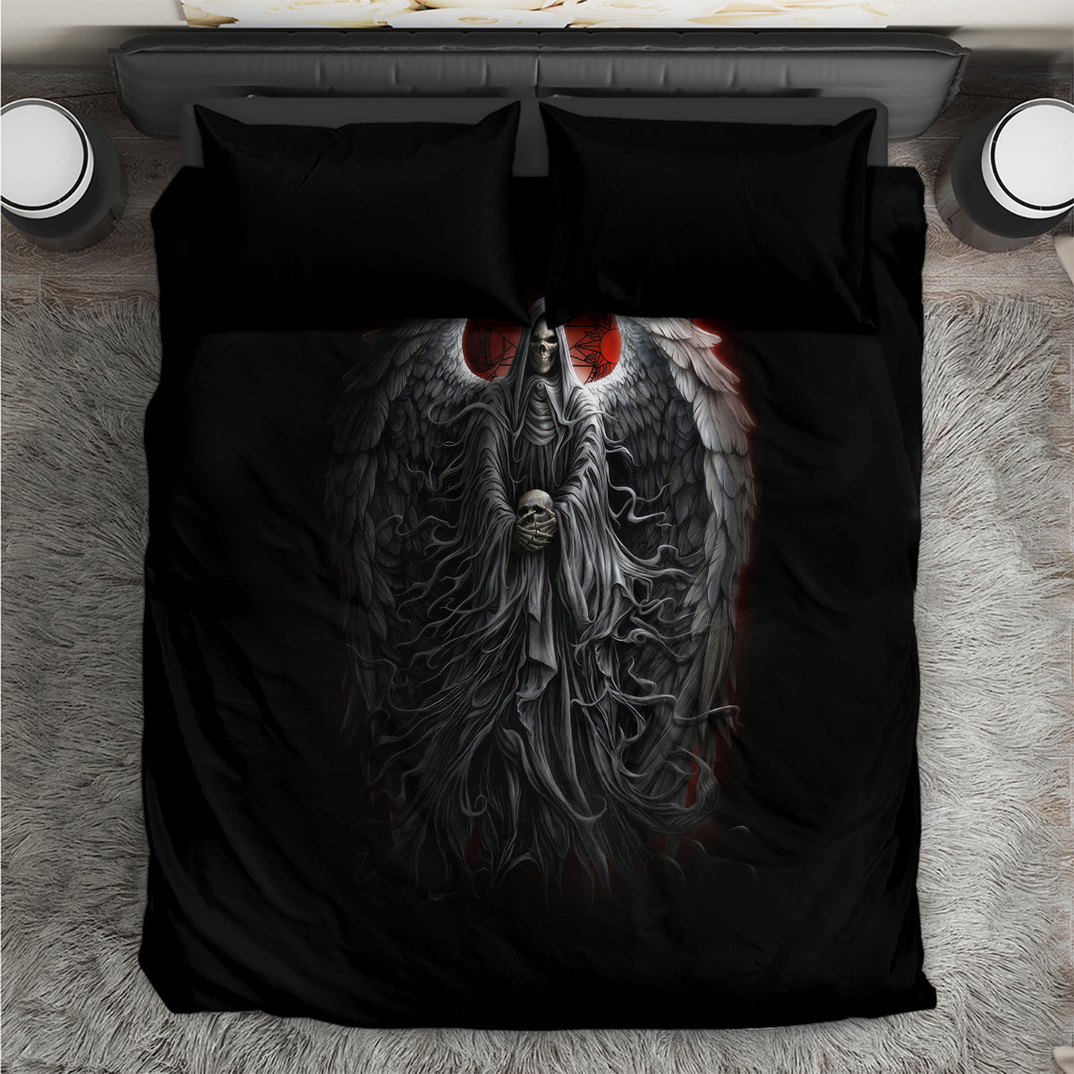 Black bedding set with winged angel graphic on duvet and two matching pillow shams