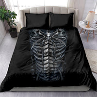 Black bedding set with skull skeleton ribcage print, shown on bed with two pillowcases