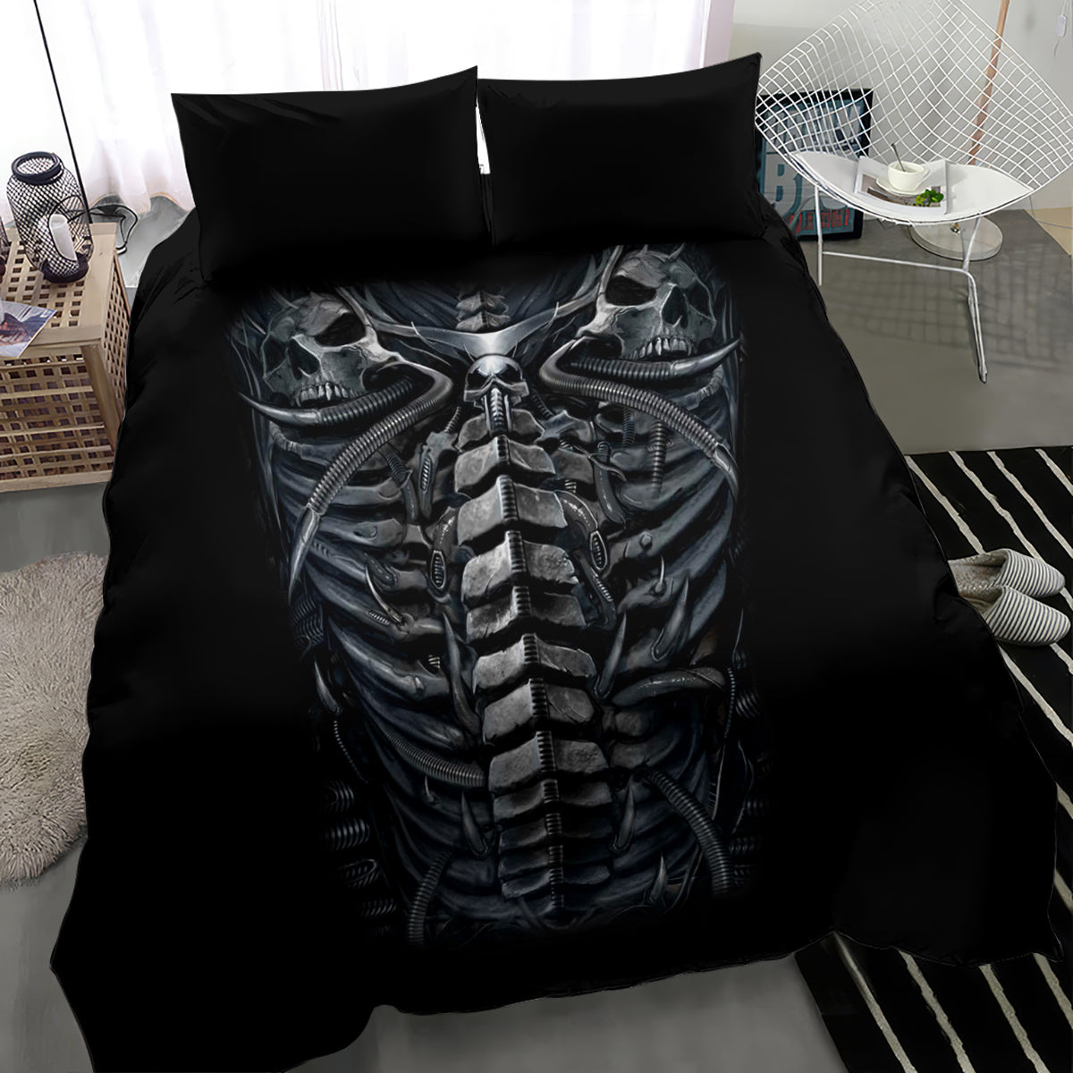 Black duvet cover with large skull-and-skeleton ribcage graphic and two black pillows