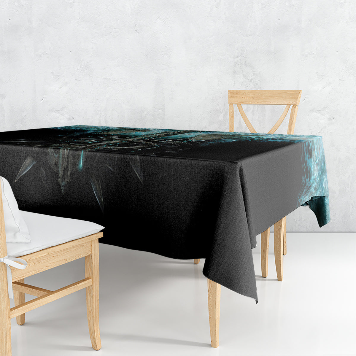 Black tablecloth with blue flame edge print, hanging over rectangular table