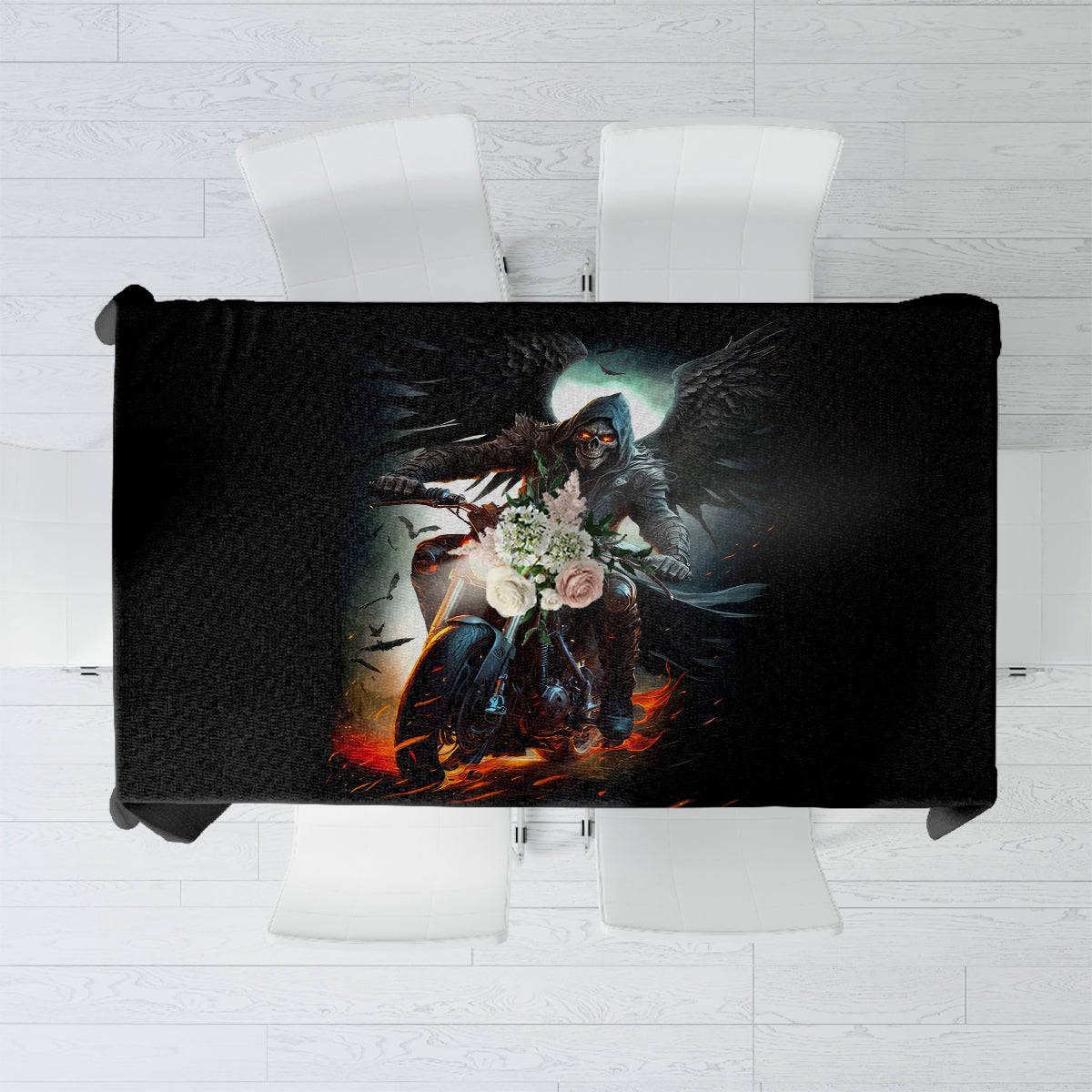 Black printed tablecloth with flaming skull angel-wing rider design, centered.
