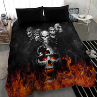 Flaming skull bedding set in black with orange fire flames; duvet and pillowcases shown