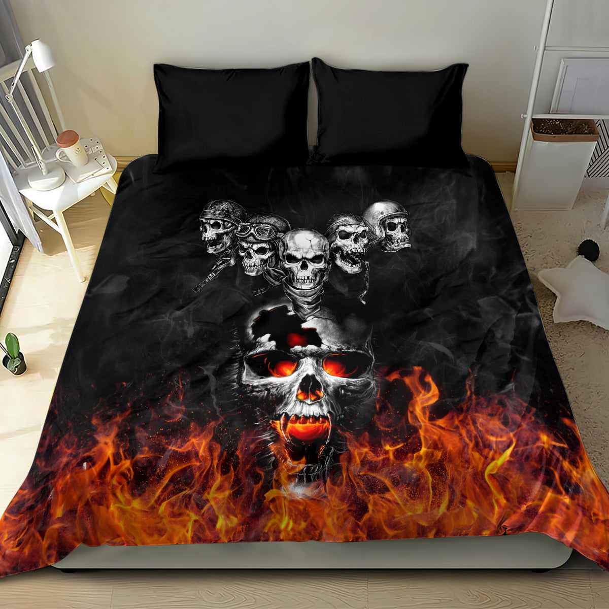 Black flaming skull bedding set featuring skull faces above orange fire flames on duvet