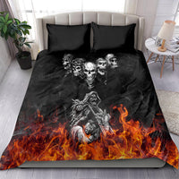 Black duvet with skull faces and biker skeleton, fiery orange flames; black pillowcases
