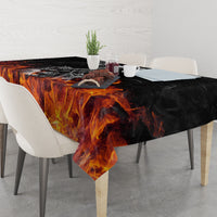 Black tablecloth with fiery orange flame pattern and skulls print