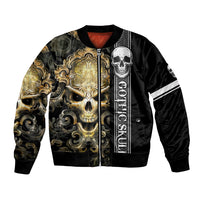 Black unisex bomber jacket with gold skull graphic, front zipper, ribbed collar and cuffs