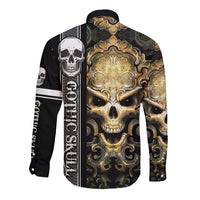 Black long sleeve button shirt with back skull graphic and gold filigree design