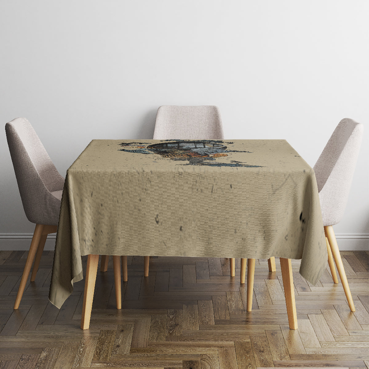 Beige tablecloth on square dining table with centered skull and blue-toned design