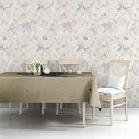 Beige tablecloth on a long table with skull illustration and floral accent details